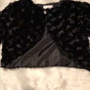 A black dressy shaw for a young lady.